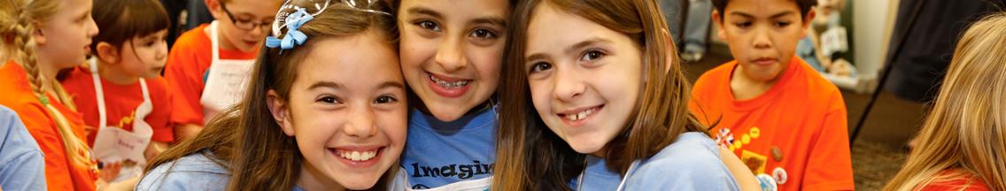 three girls smiling